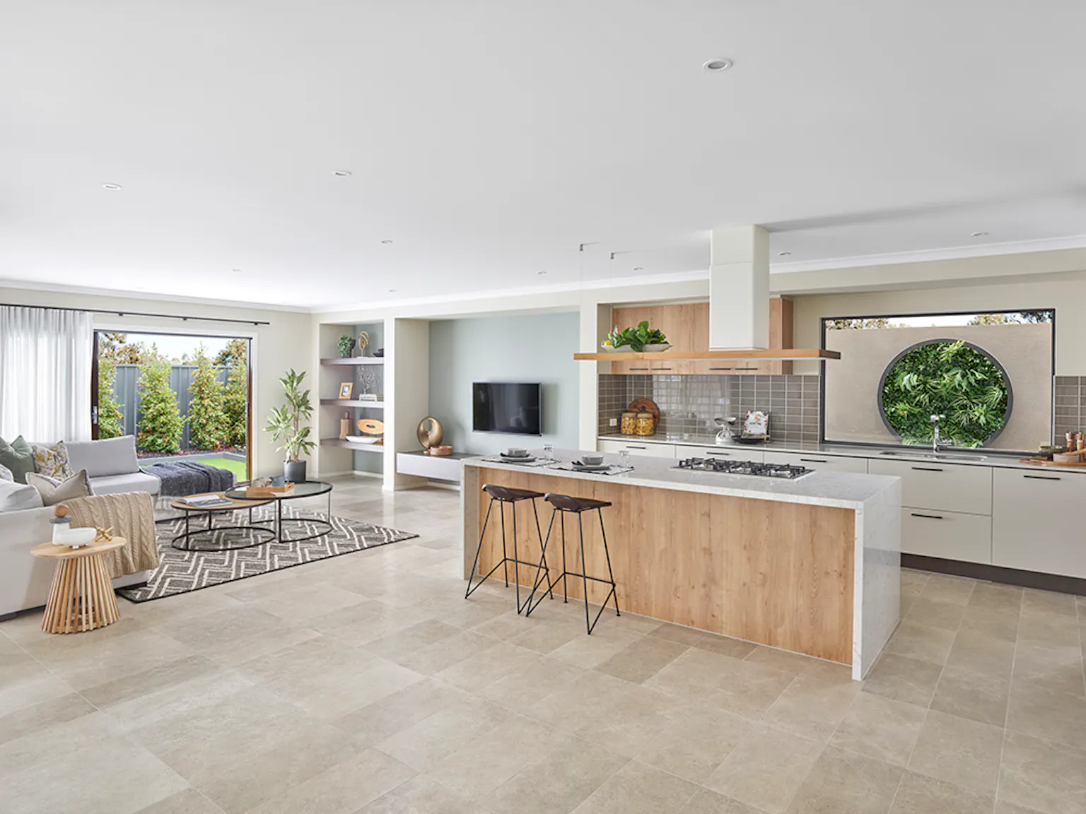 16. Let plenty of natural light in like the Marion 42 display home in Truganina, Victoria featuring a large window splash back