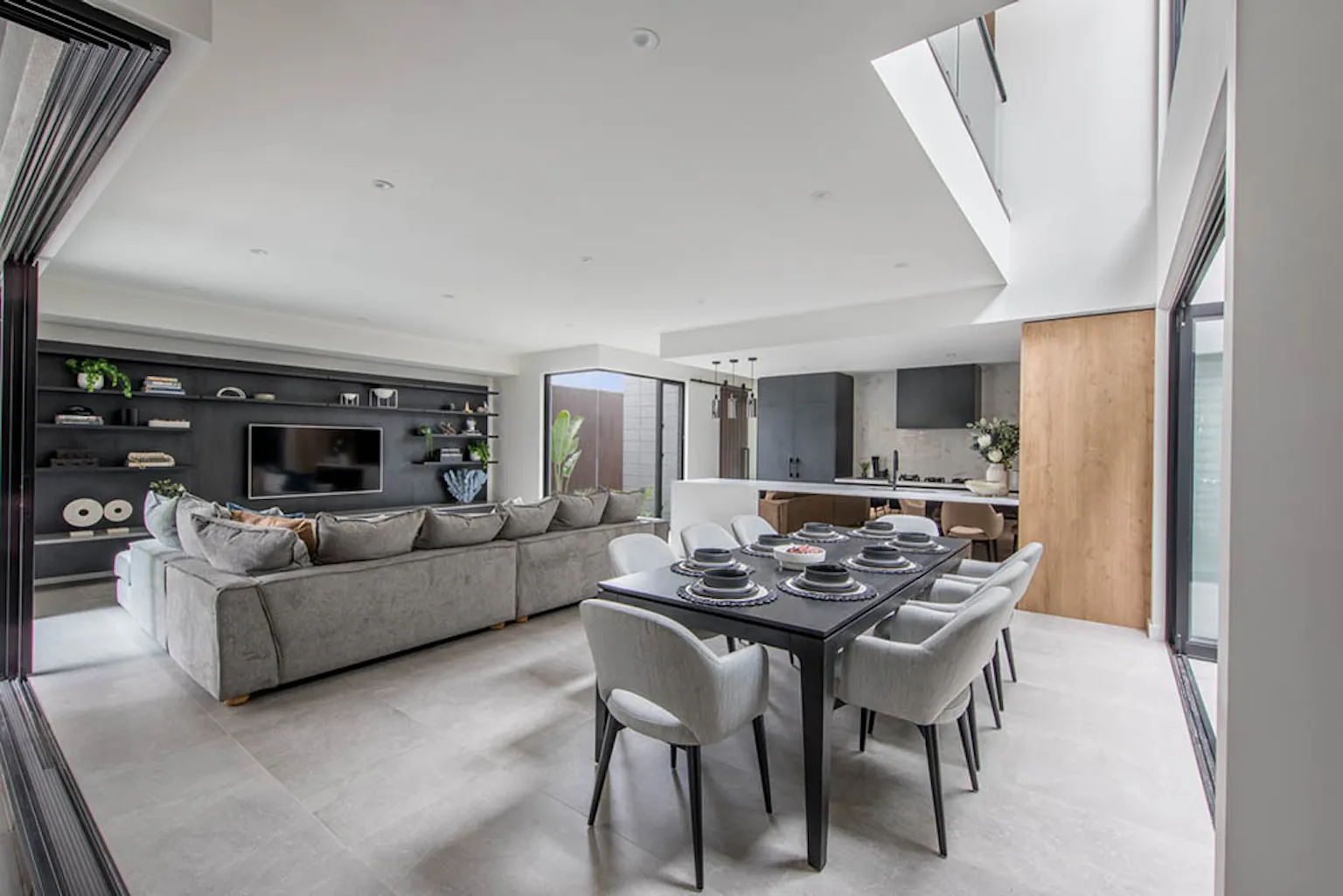 17. The Moritz home design uses grey and slate tones for a mature interior style