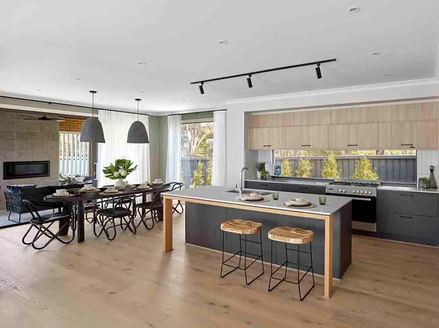 2. The Merricks MK2 display home at Cowes, Victoria mixes light and dark timber for a stunning contrast