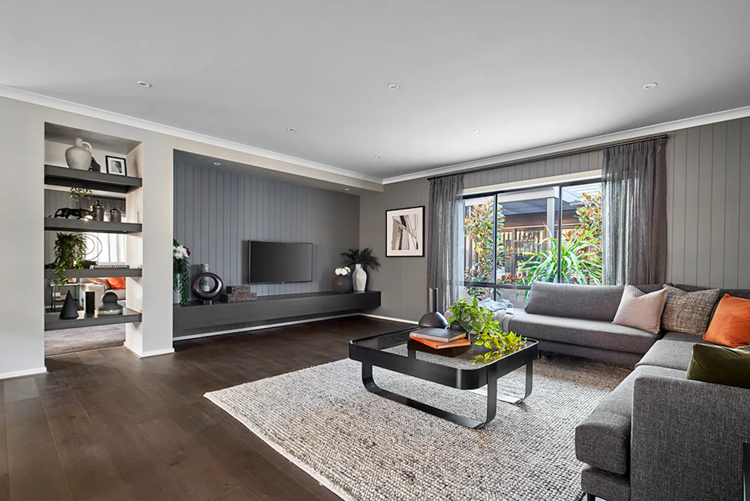 Opt for homes with multiple living areas so everyone has a space to call their own.